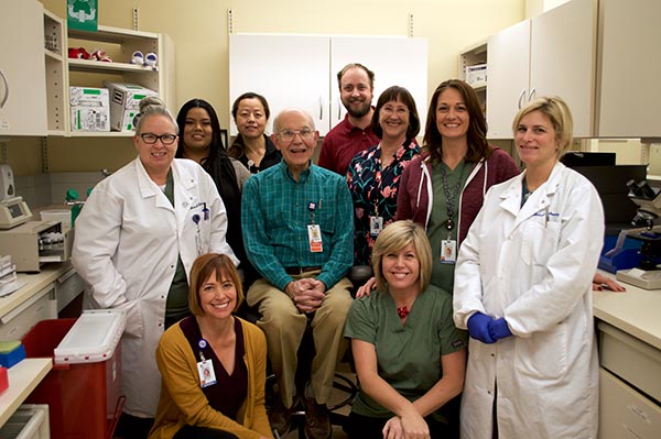 Dr. Machin with Laboratory staff