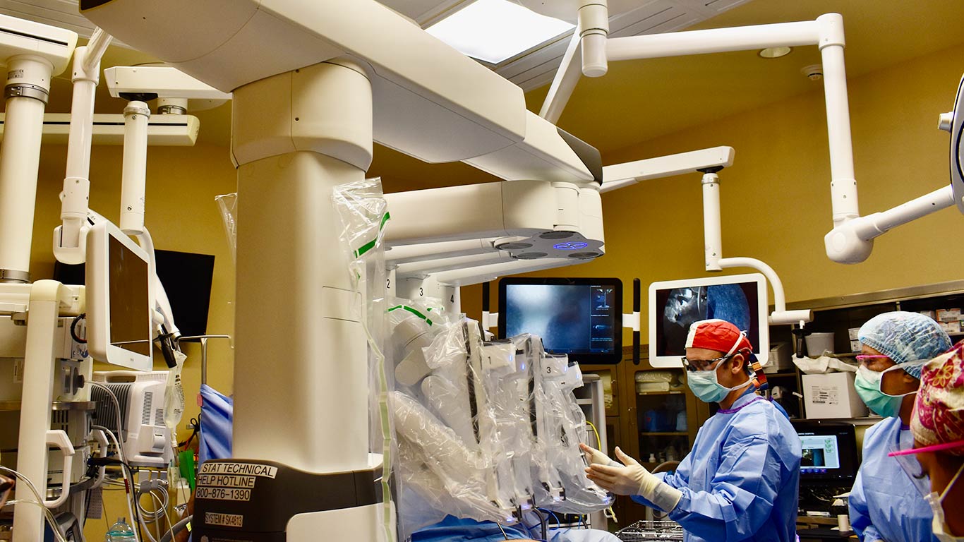 doctors using robotic surgery machines