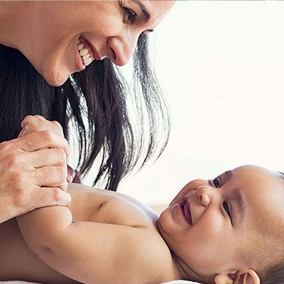 woman smiling with baby